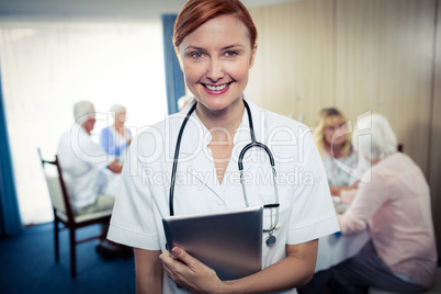 Portrait of a nurse with tablet computer