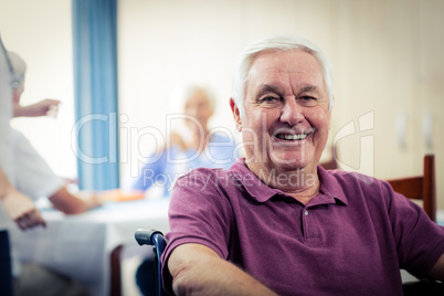 Portrait of a senior man in wheelchair