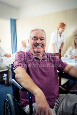 Portrait of a senior man in wheelchair