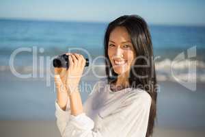 Woman holding binoculars