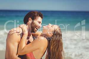 Couple having fun on beach