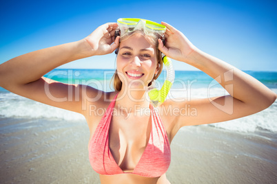 Woman posing with diving mask
