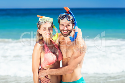 Couple embracing each other on beach