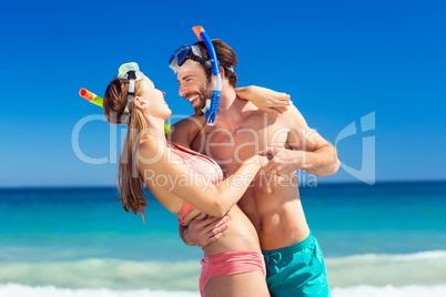 Couple embracing each other on beach