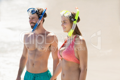 Couple standing on beach