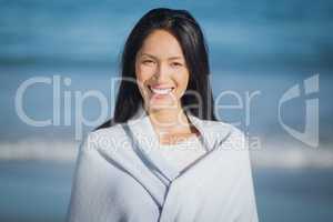 Young woman standing on beach