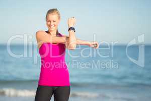 Woman exercising on beach
