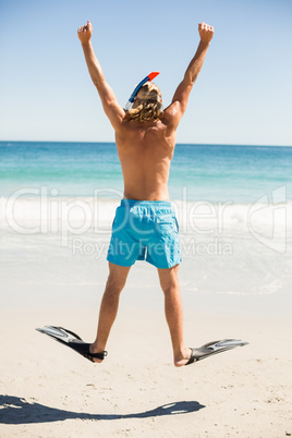Man jumping on beach