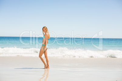 Woman standing on beach