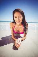 Woman lying on beach