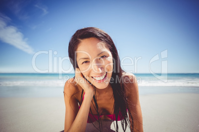 Woman lying on beach