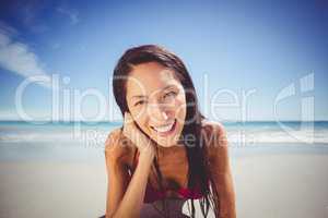 Woman lying on beach