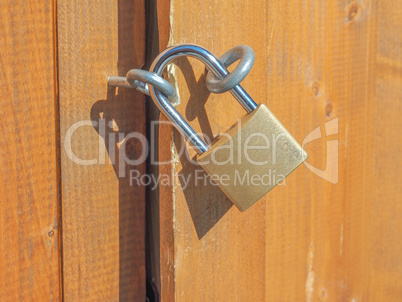 Padlock on a wood door