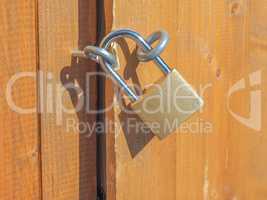 Padlock on a wood door