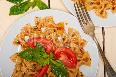 Italian pasta farfalle butterfly bow-tie and tomato sauce