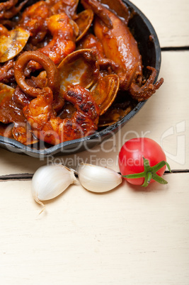 fresh seafoos stew on an iron skillet