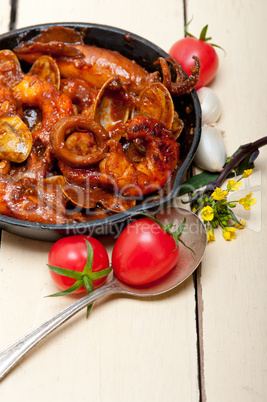 fresh seafoos stew on an iron skillet