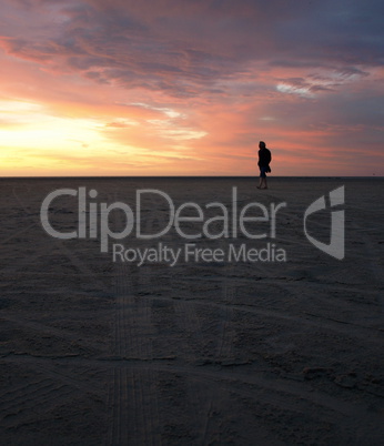 Photo of beach sunset and person