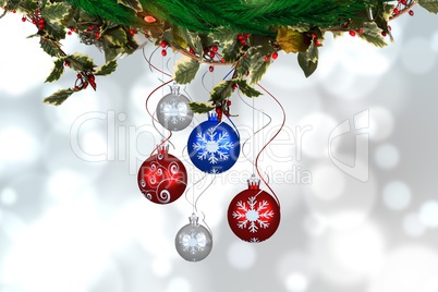 Composite image of Christmas ornaments