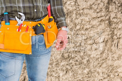 Composite image of a worker is posing