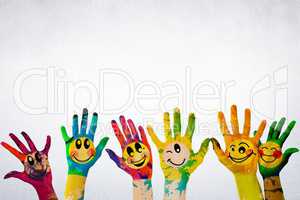 Composite image of children hands with paint