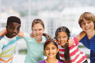 Composite image of cute children are holding together