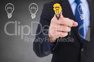 Composite image of businessman is touching drawn bulb