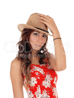 Young woman with a brown hat.