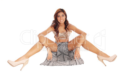 Beautiful woman sitting on floor.