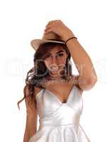 Pretty girl in dress and cowboy hat.