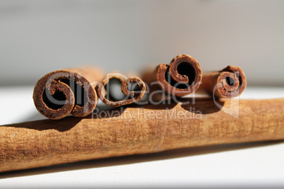 Four cinnamon sticks in the fifth from the end, daylight