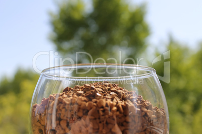 wine glass with granulated coffee in the center