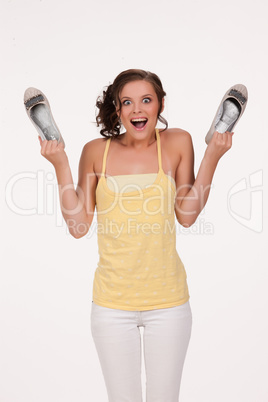 Young Emotional Woman With Shoes