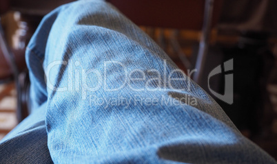 Blue jeans man sitting