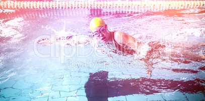 Swimmer woman swimming in the swimming pool