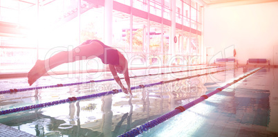 Woman diving in swimming pool