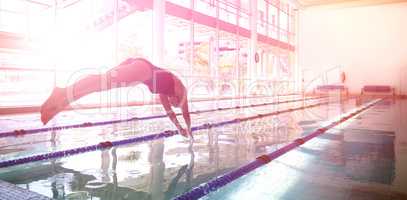 Woman diving in swimming pool