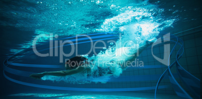 Composite image of athletic swimmer smiling at camera underwater