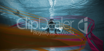 Composite image of athletic swimmer training on her own