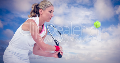 Composite image of athlete playing tennis with a racket