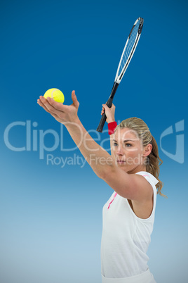 Composite image of athlete holding a tennis racquet ready to ser