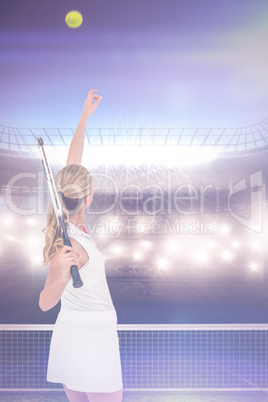 Composite image of athlete holding a tennis racquet ready to ser