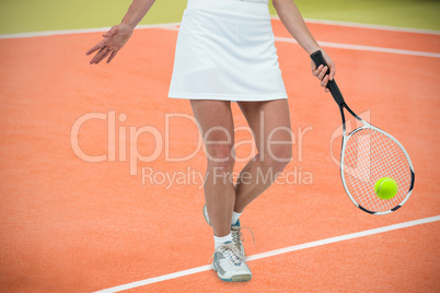 Composite image of athlete playing tennis with a racket