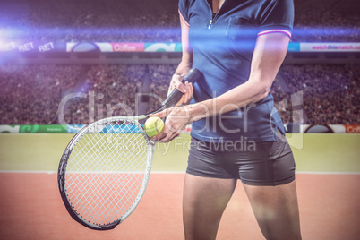 Composite image of tennis player holding a racquet ready to serve