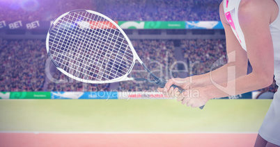 Composite image of athlete playing tennis with a racket