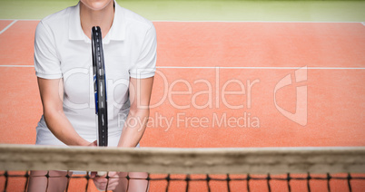 Composite image of female athlete playing tennis