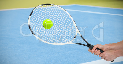 Composite image of athlete playing tennis with a racket