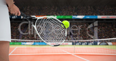 Composite image of athlete playing tennis with a racket