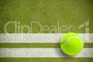 Composite image of tennis ball with a syringe