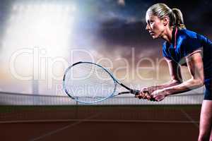 Composite image of tennis player playing tennis with a racket